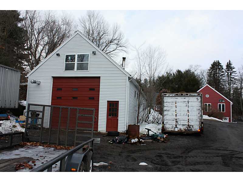 616 Snake Hill Road Glocester, RI 02857 - Photo 8 of 20 Exterior Back. view from behind detached garage looking toward house