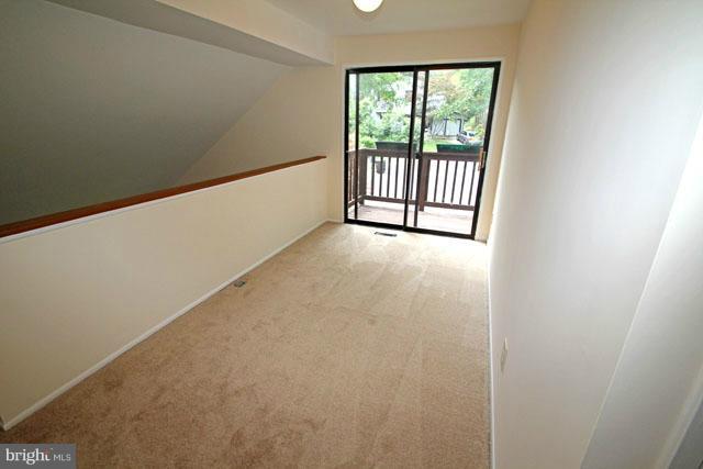 1105 North Rockingham Street Arlington, VA 22205 - Photo 18 of 24 a view of a big room with wooden floor and windows