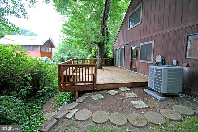 1105 North Rockingham Street Arlington, VA 22205 - Photo 20 of 24 a view of a chair and table in backyard