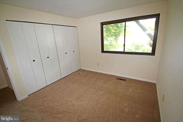 1105 North Rockingham Street Arlington, VA 22205 - Photo 4 of 24 a view of an empty room with a window