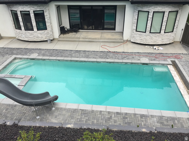 614 East High Lane Alpine, UT 84004 - Photo 11 of 75 Swimming pool featuring a patio and a water slide