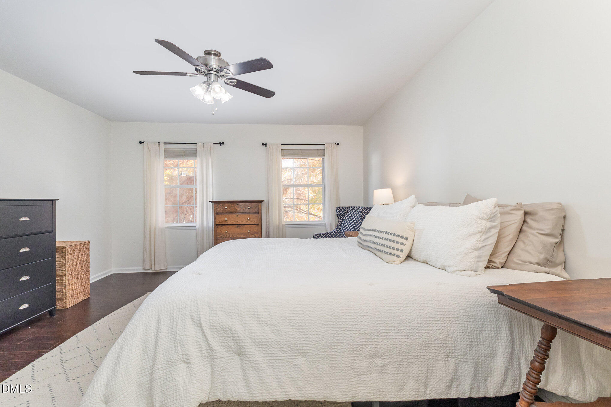2211 Springhill Avenue Raleigh, NC 27603 - Photo 18 of 42 a large bedroom with a bed and window