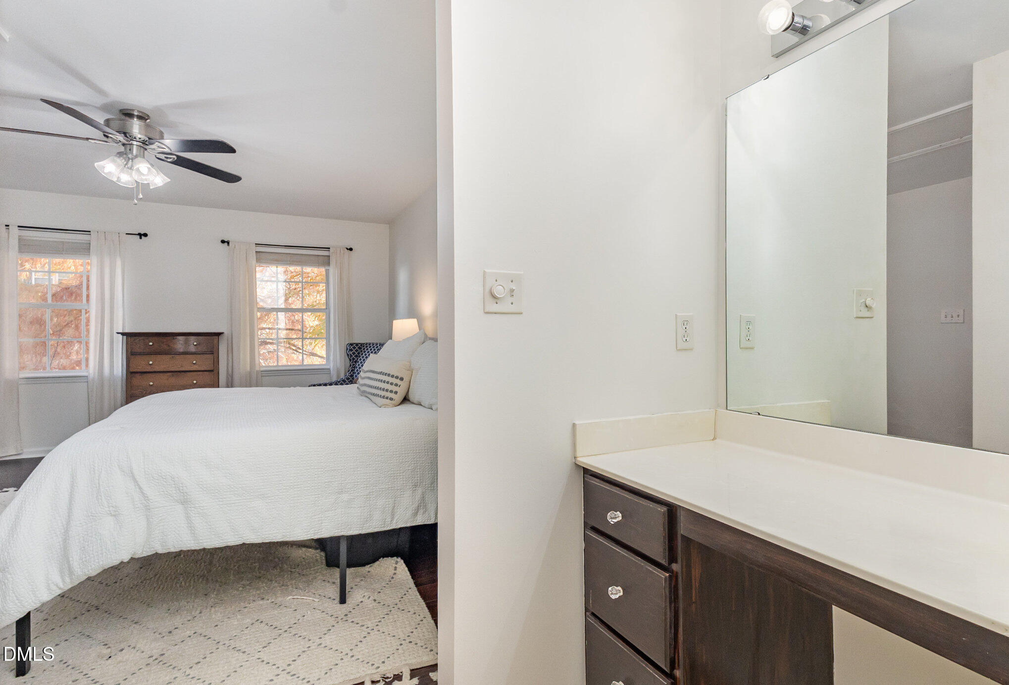 2211 Springhill Avenue Raleigh, NC 27603 - Photo 22 of 42 a spacious bedroom with a bed and a dresser