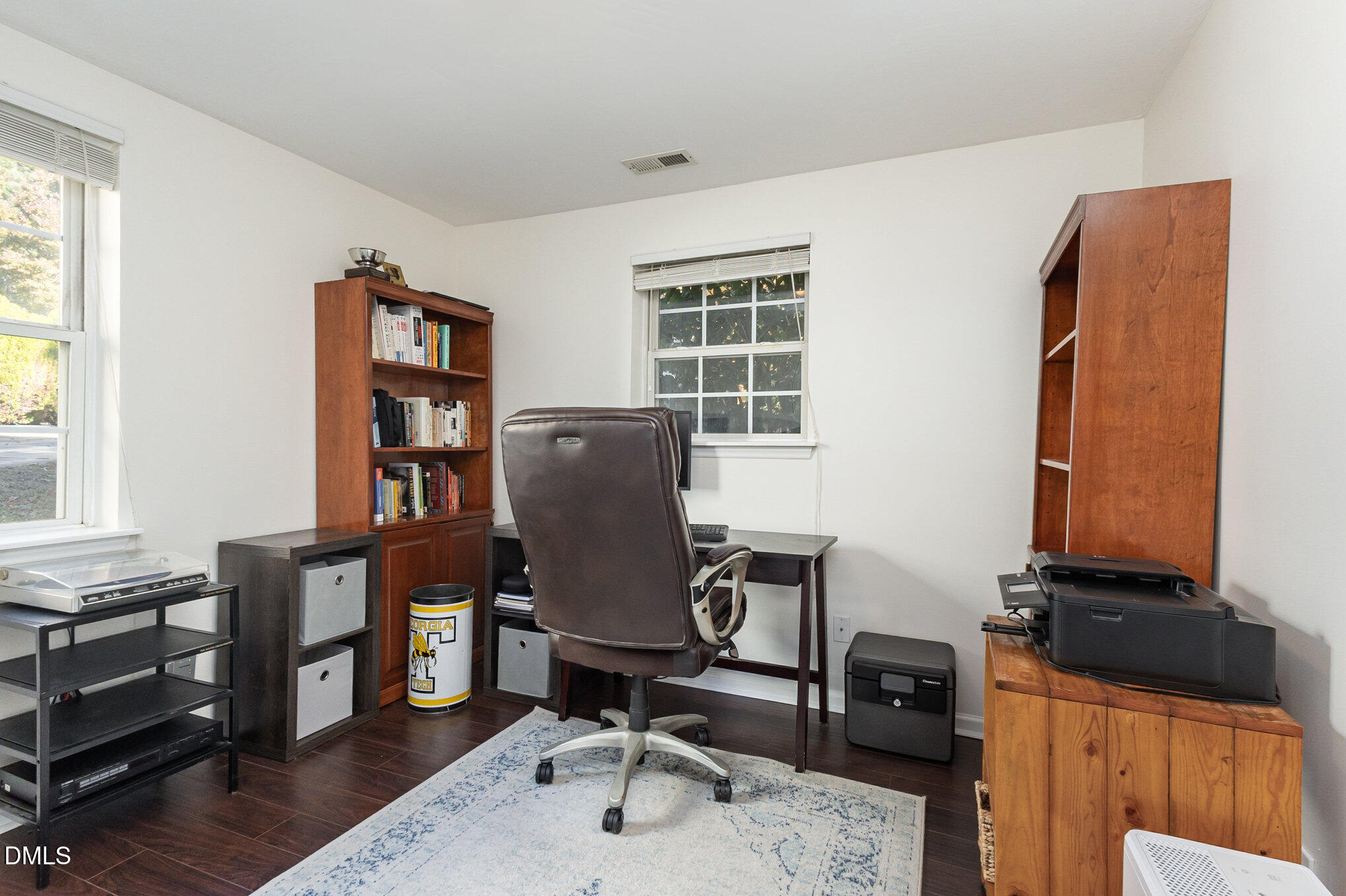 2211 Springhill Avenue Raleigh, NC 27603 - Photo 25 of 42 a view of a workspace with furniture and a window
