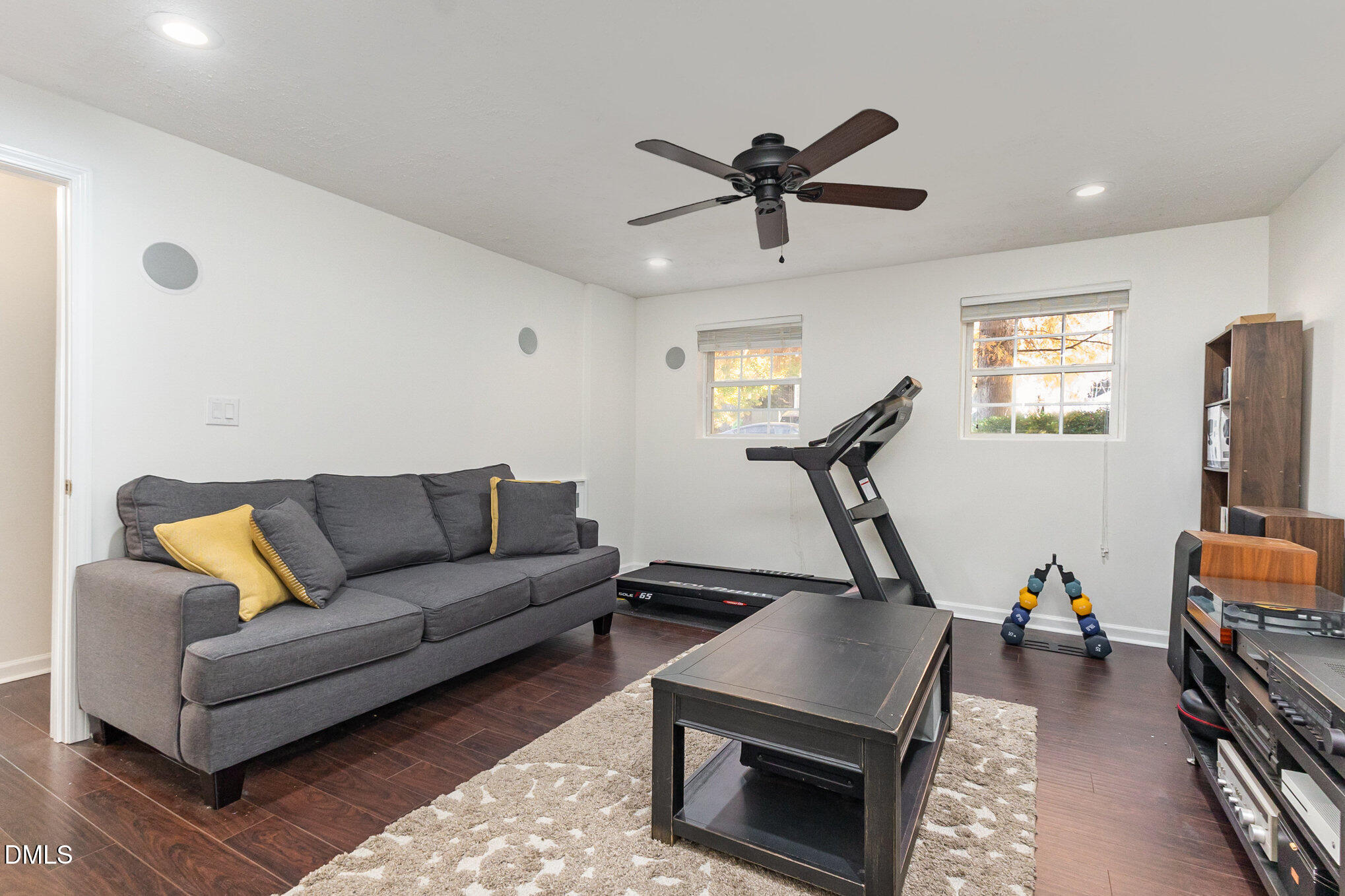 2211 Springhill Avenue Raleigh, NC 27603 - Photo 27 of 42 a living room with furniture a air conditioner and a window