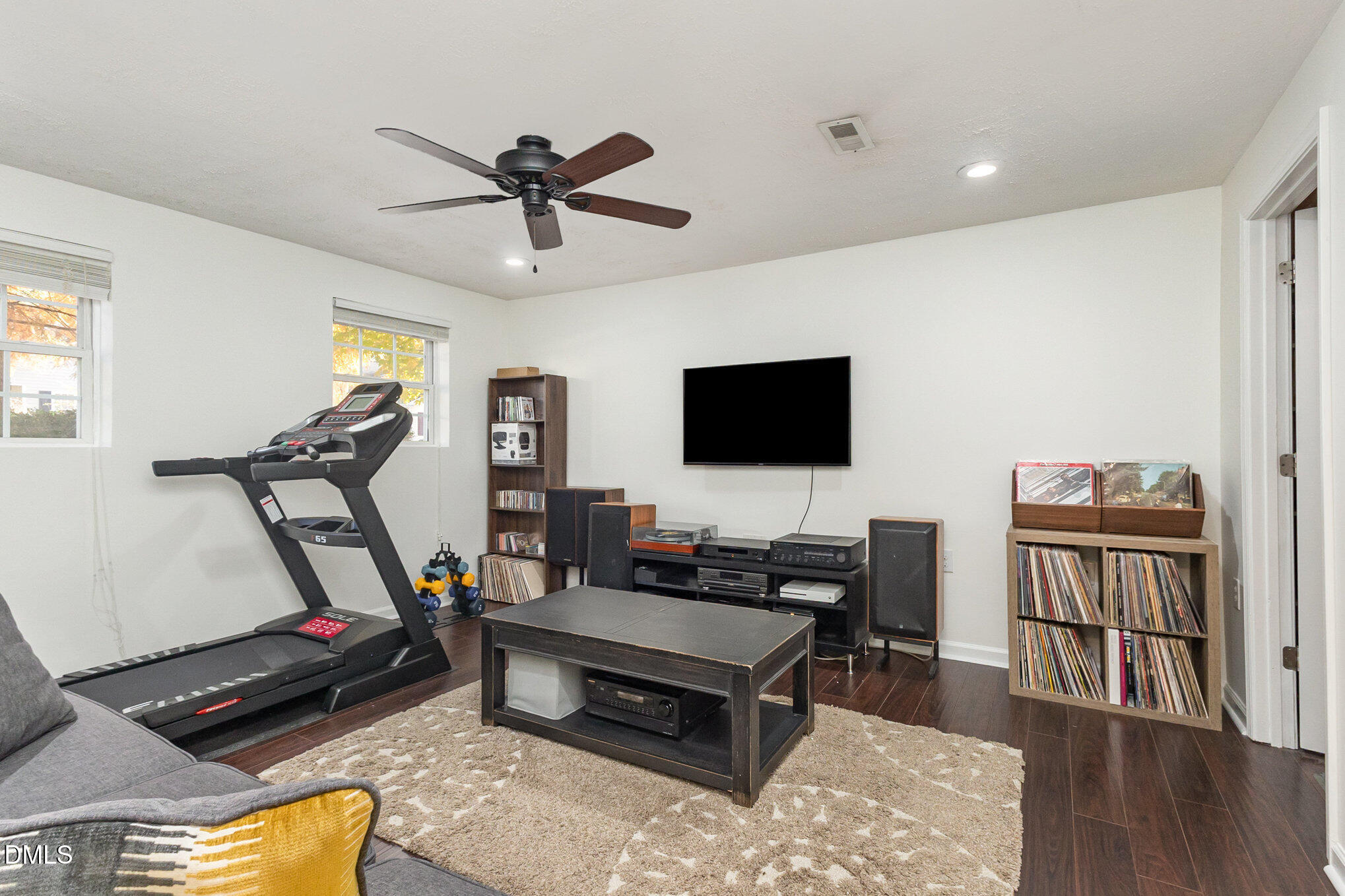 2211 Springhill Avenue Raleigh, NC 27603 - Photo 28 of 42 a living room with furniture and a flat screen tv