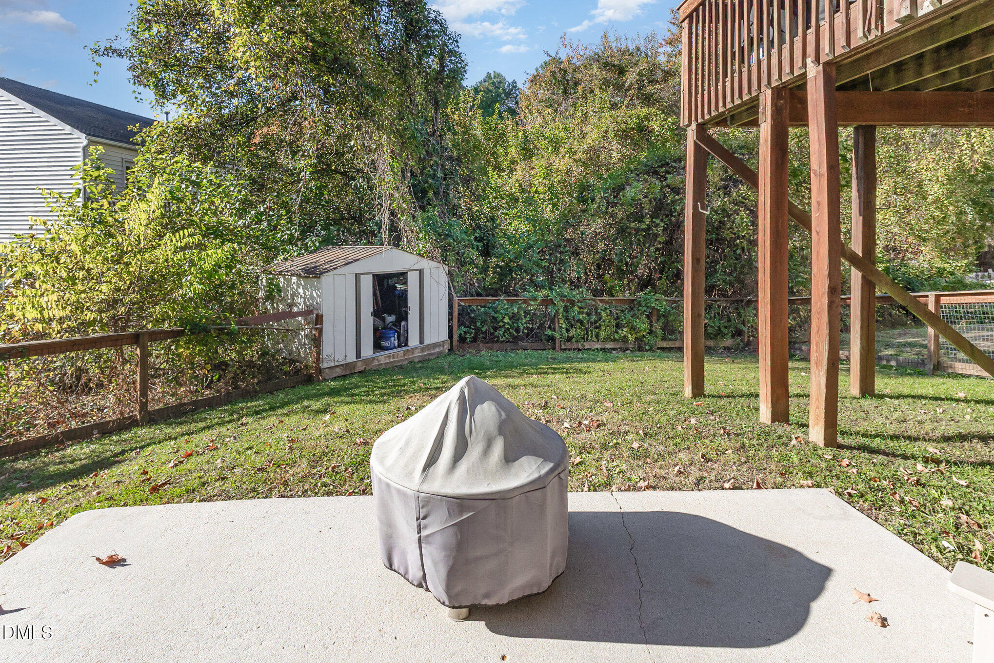 2211 Springhill Avenue Raleigh, NC 27603 - Photo 34 of 42 a view of a house with backyard and sitting area