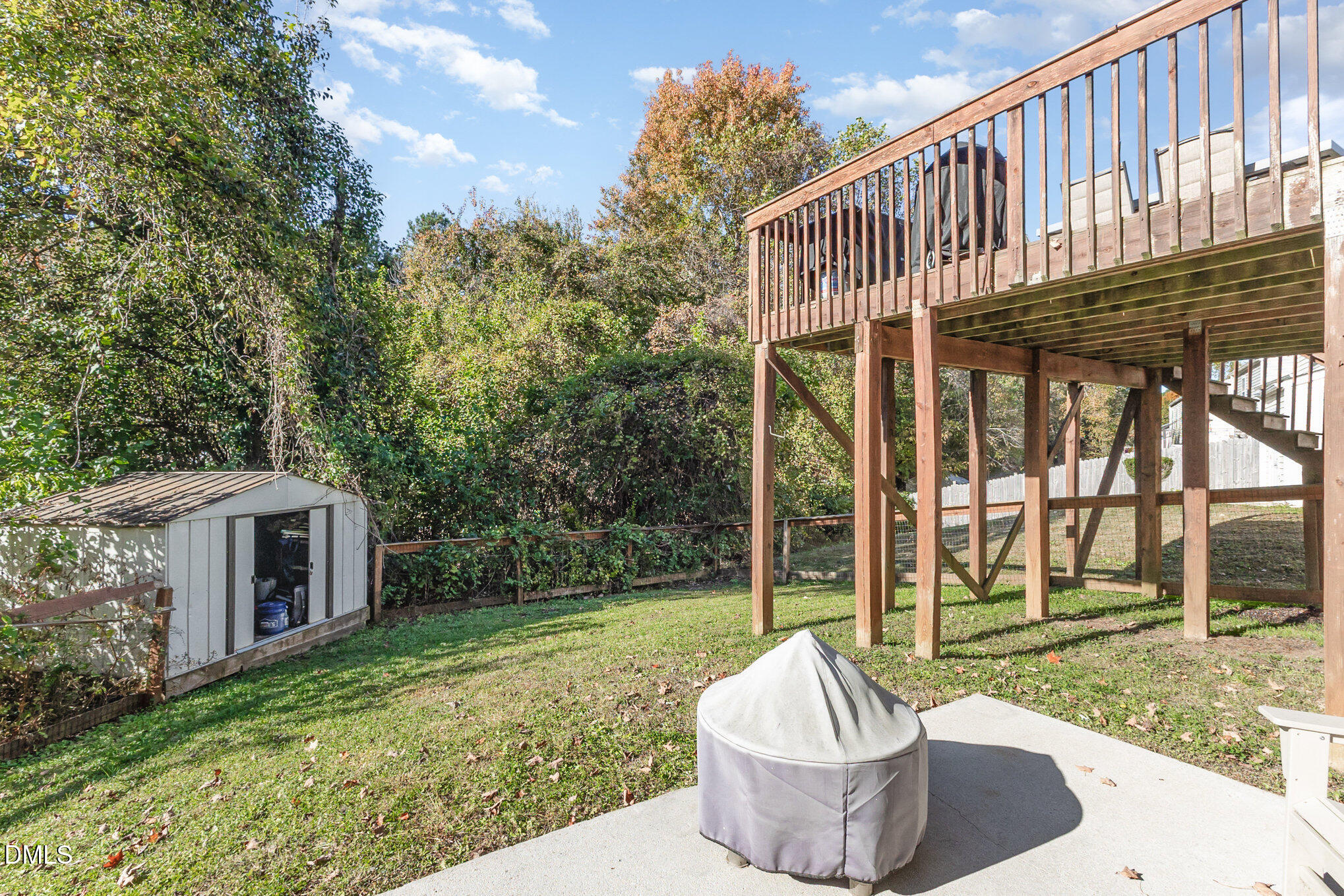 2211 Springhill Avenue Raleigh, NC 27603 - Photo 35 of 42 a view of a patio with couches chairs and a yard