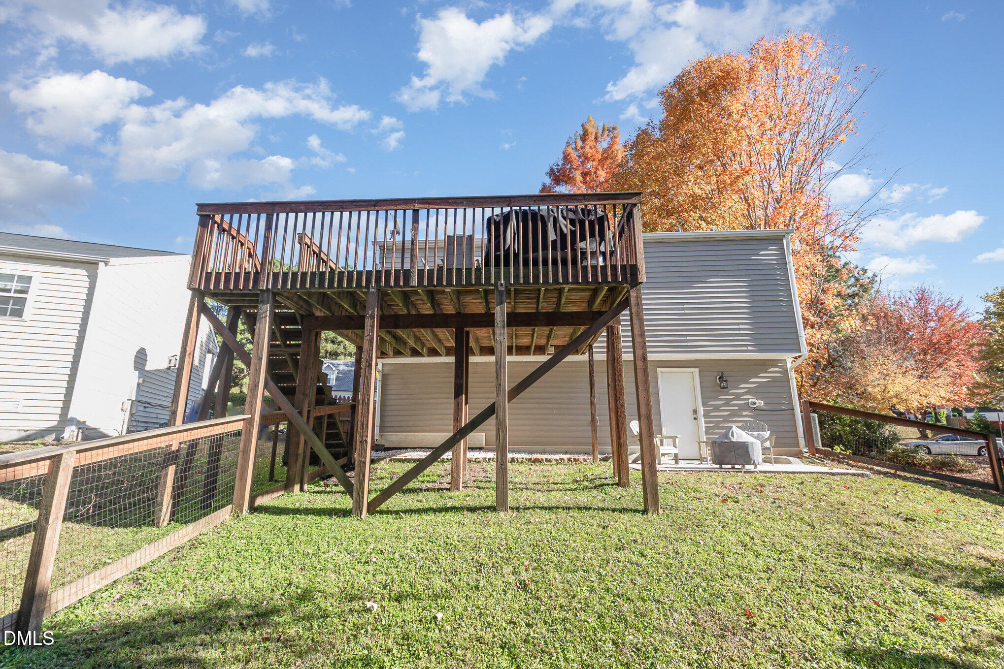 2211 Springhill Avenue Raleigh, NC 27603 - Photo 36 of 42 a house with trees in the background
