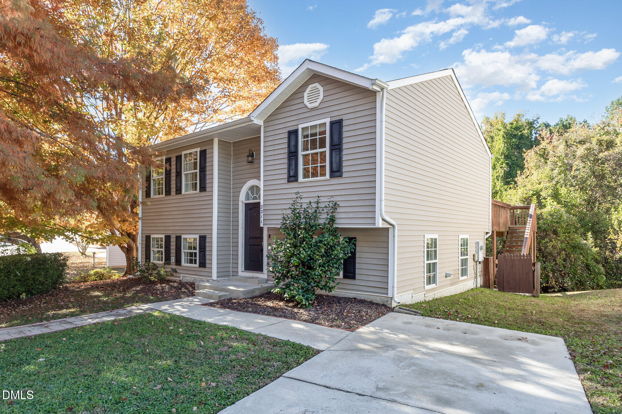 2211 Springhill Avenue Raleigh, NC 27603 - Photo 4 of 42 a front view of a house with garden
