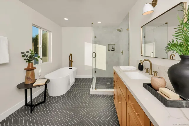 a view of a dining room with furniture and a mirror