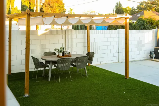 a view of yard with patio