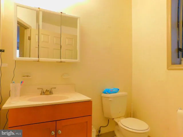 a bathroom with a sink and a toilet
