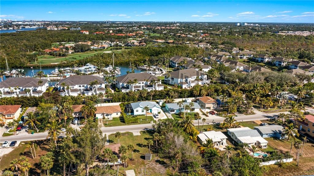 Danford Street Naples, FL 34112 - Photo 17 of 20 Drone / aerial view featuring a water view