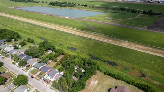 a view of a city with a lake