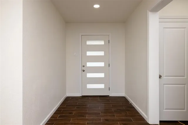 a view of an empty room and window