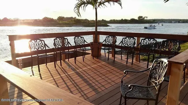 a view of a chairs and table on the terrace