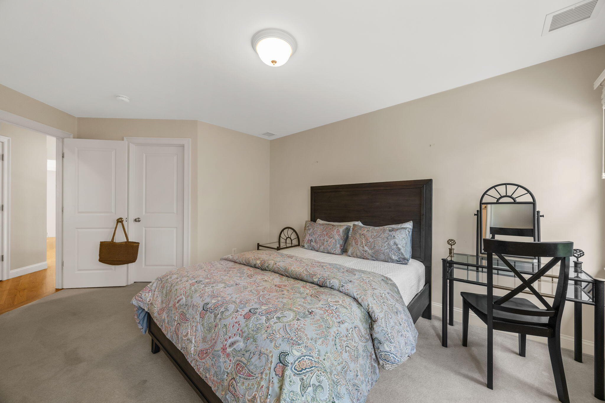 17 Payamps Road Mashpee, MA 02649 - Photo 51 of 72 a bedroom with a bed and a cabinets