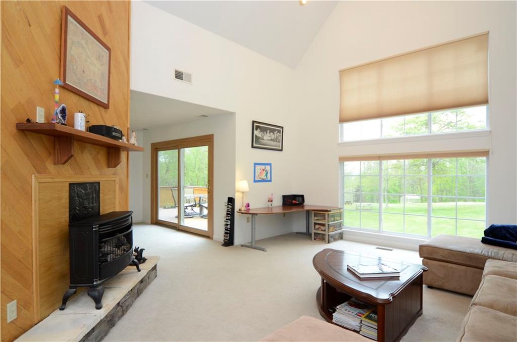 218 Tate Road Hookstown, PA 15050 - Photo 4 of 24 The Gas Fireplace provides a warm cozy feel.