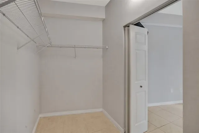 a view of an empty walk in closet