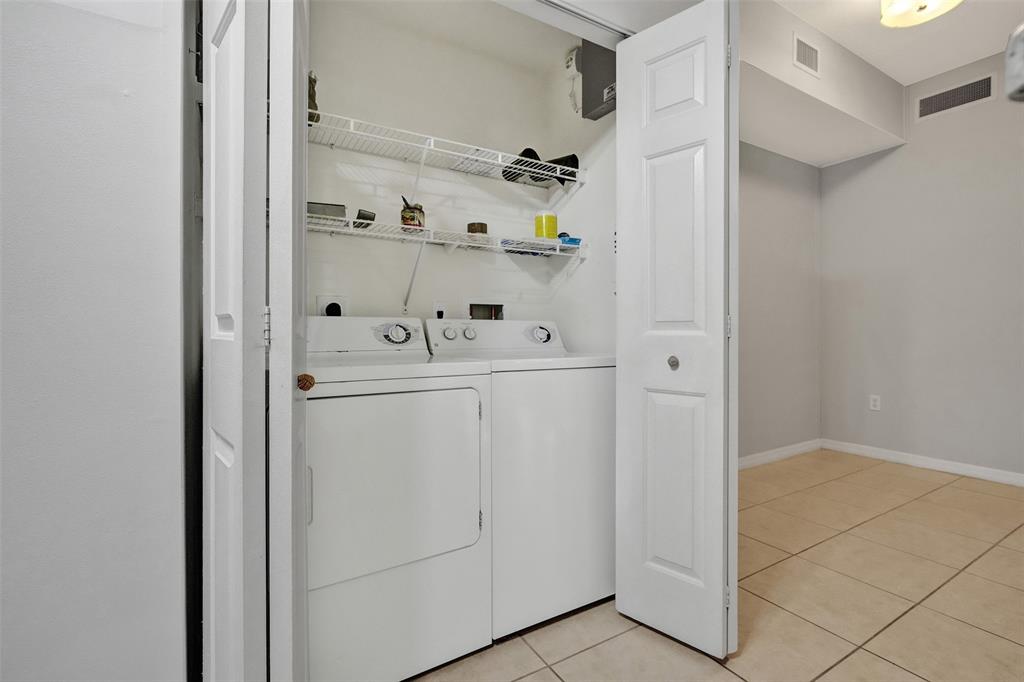 2421 Northeast 65th Street, Unit 2113 Fort Lauderdale, FL 33308 - Photo 30 of 45 a utility room with dryer and washer