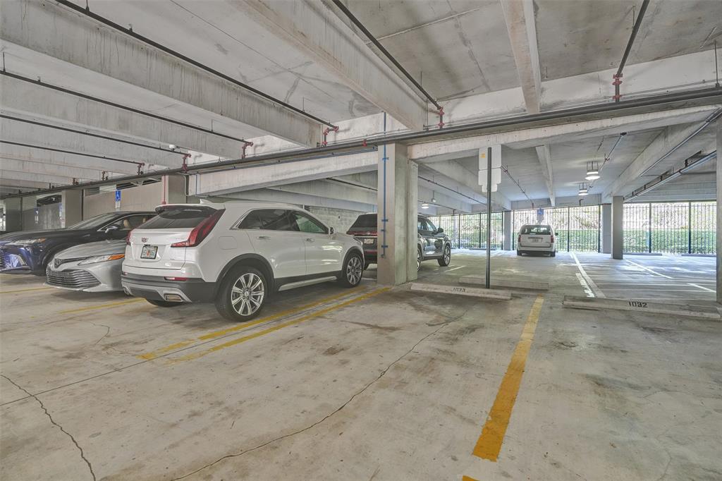 2421 Northeast 65th Street, Unit 2113 Fort Lauderdale, FL 33308 - Photo 31 of 45 a view of a cars parking space