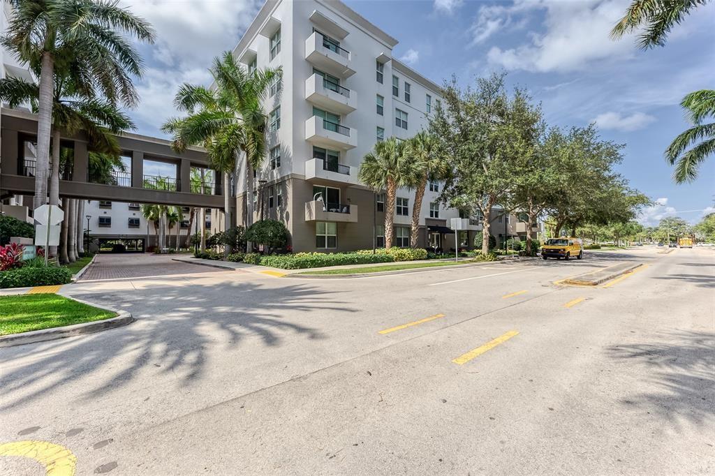 2421 Northeast 65th Street, Unit 2113 Fort Lauderdale, FL 33308 - Photo 45 of 45 a view of road with yard