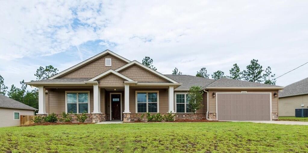 6206 Timberland Ridge Drive Crestview, FL 32539 - Photo 2 of 34 front view of a house with a yard