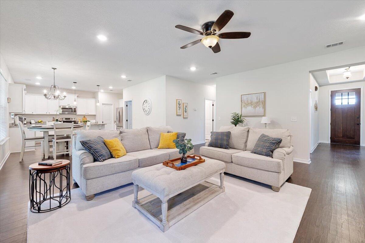 6206 Timberland Ridge Drive Crestview, FL 32539 - Photo 4 of 34 a living room with furniture and kitchen view