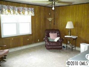 2091 Junction Road Cooleemee, NC 27014 - Photo 3 of 8 a living room with furniture and a window
