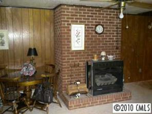 2091 Junction Road Cooleemee, NC 27014 - Photo 4 of 8 a bathroom with a sink and a mirror