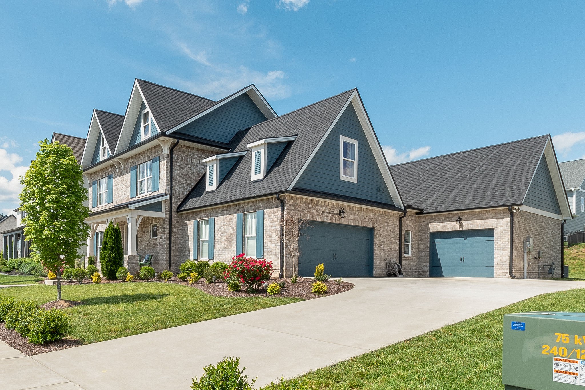 115 Vanner Road Mount Juliet, TN 37122 - Photo 2 of 42 a front view of a house with a yard and garage