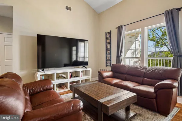 a view of livingroom and dining room with furniture