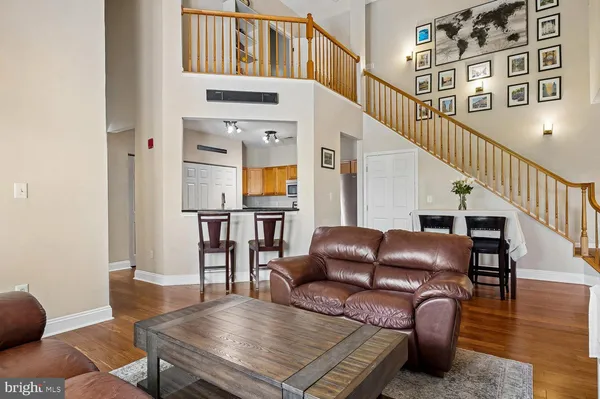 a kitchen with stainless steel appliances a refrigerator stove and sink