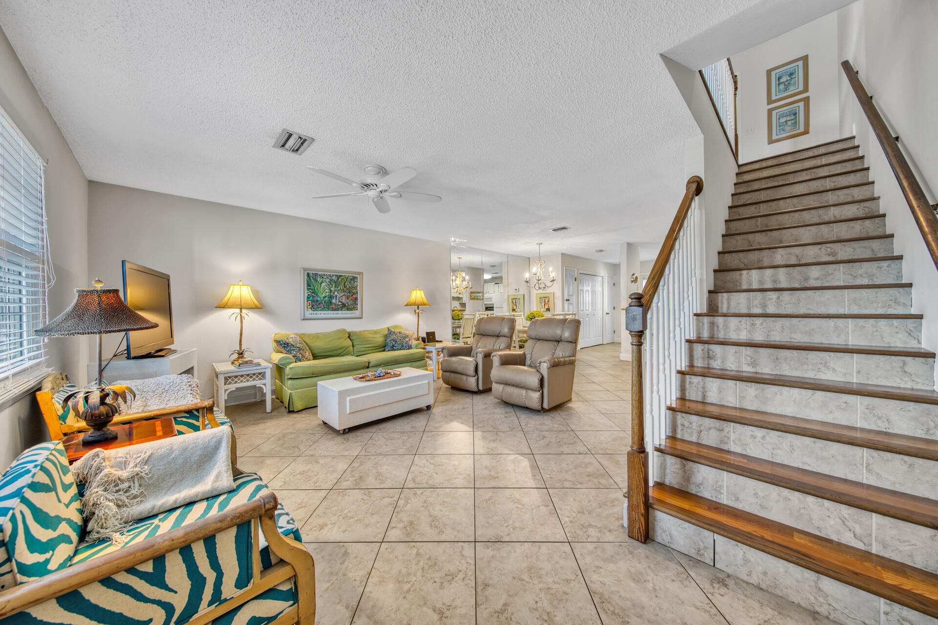 a bedroom with furniture and a lamp