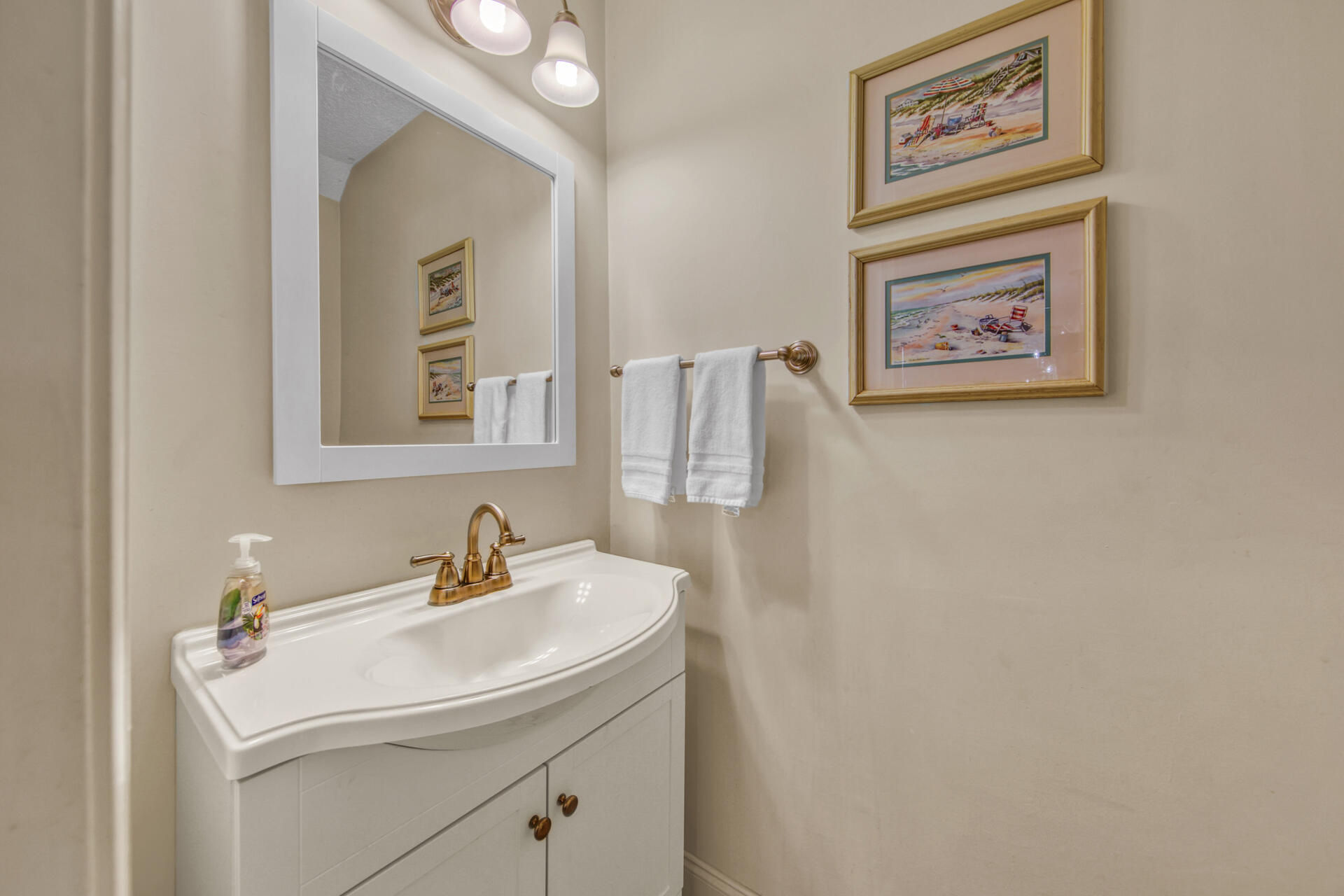 241 Ellis Road, Unit 4 Miramar Beach, FL 32550 - Photo 12 of 30 a bathroom with a sink and a mirror