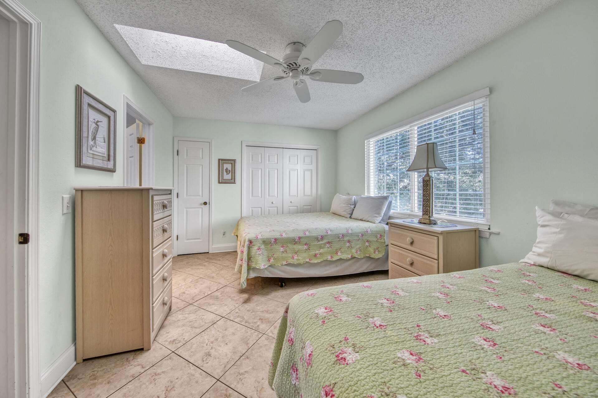 241 Ellis Road, Unit 4 Miramar Beach, FL 32550 - Photo 15 of 30 a bedroom with a large bed and a window