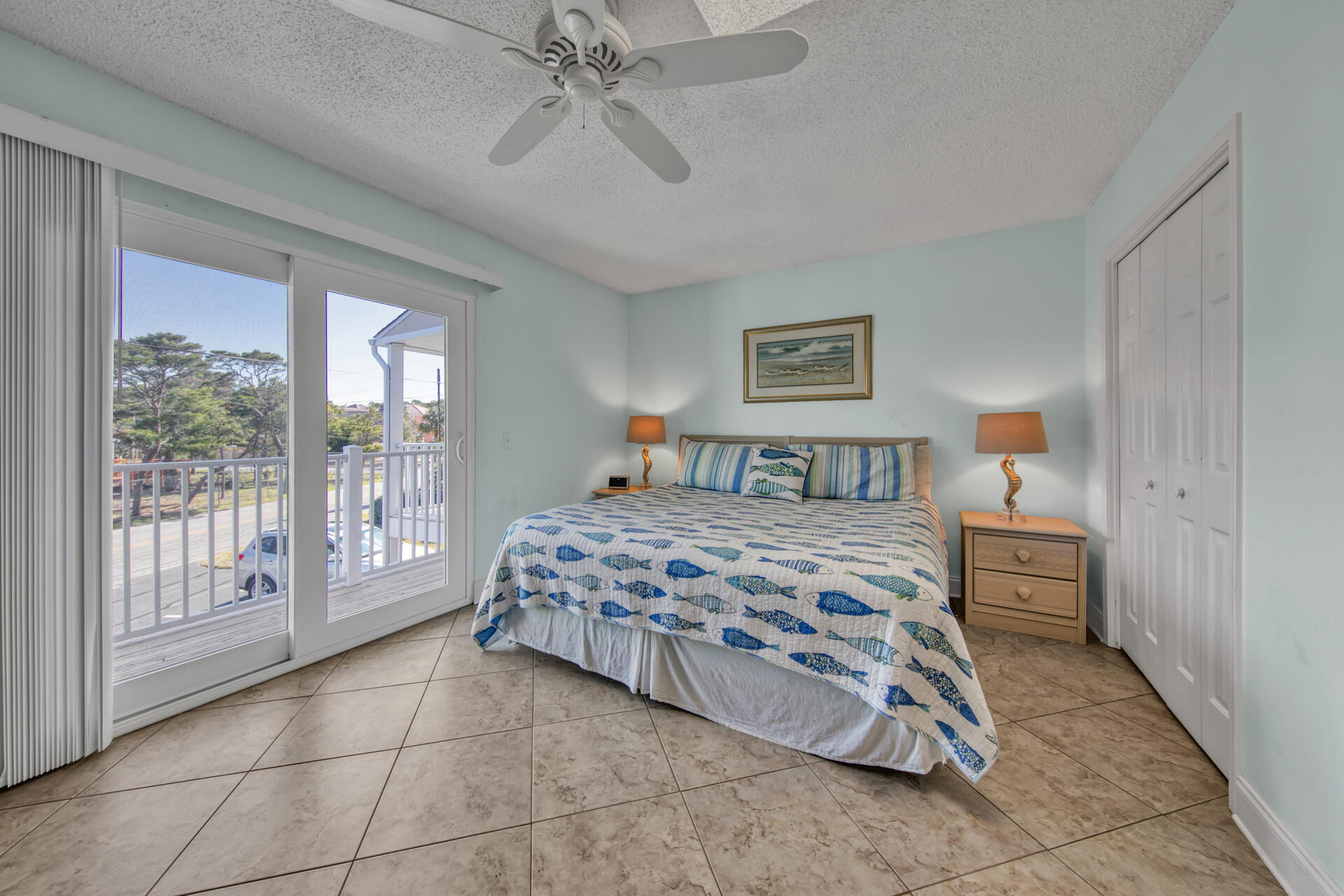 241 Ellis Road, Unit 4 Miramar Beach, FL 32550 - Photo 18 of 30 a bedroom with a large bed and a chandelier