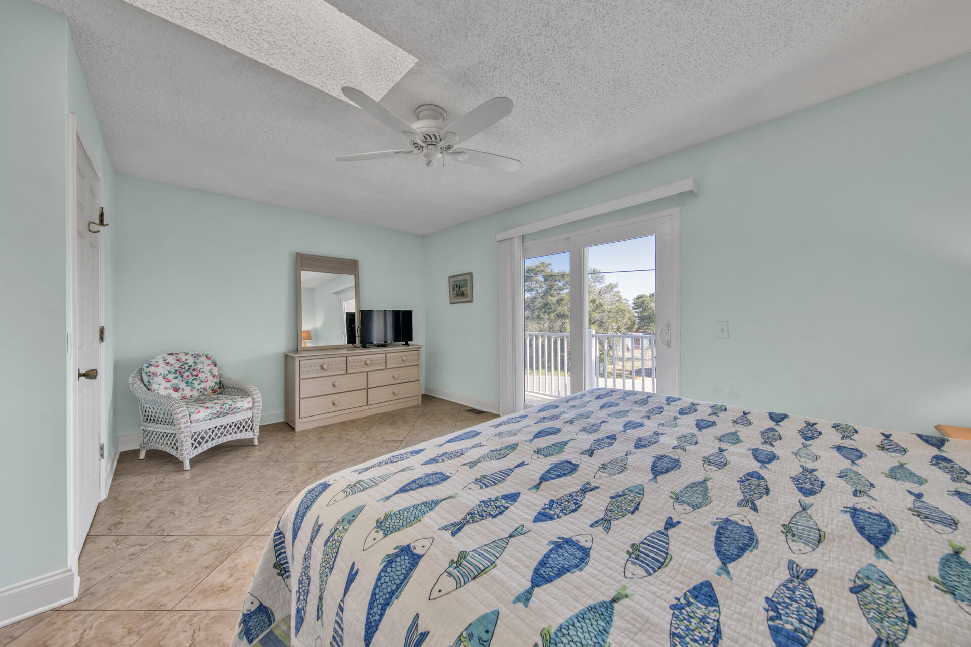 241 Ellis Road, Unit 4 Miramar Beach, FL 32550 - Photo 19 of 30 a bedroom with a bed and a window