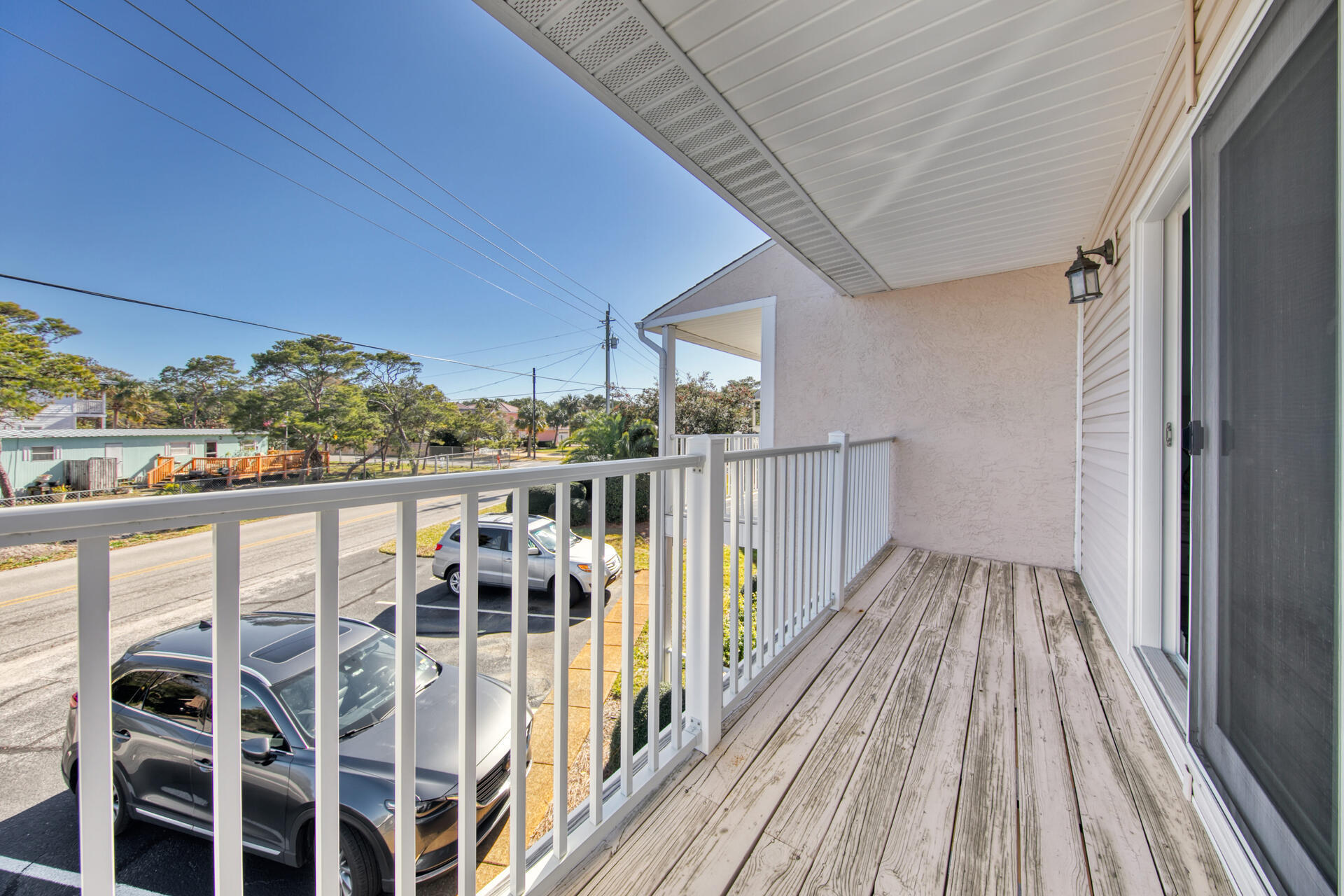 241 Ellis Road, Unit 4 Miramar Beach, FL 32550 - Photo 21 of 30 a view of balcony with wooden floor