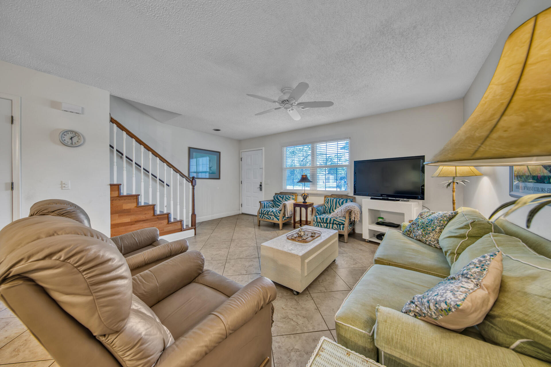 241 Ellis Road, Unit 4 Miramar Beach, FL 32550 - Photo 6 of 30 a living room with furniture and a flat screen tv