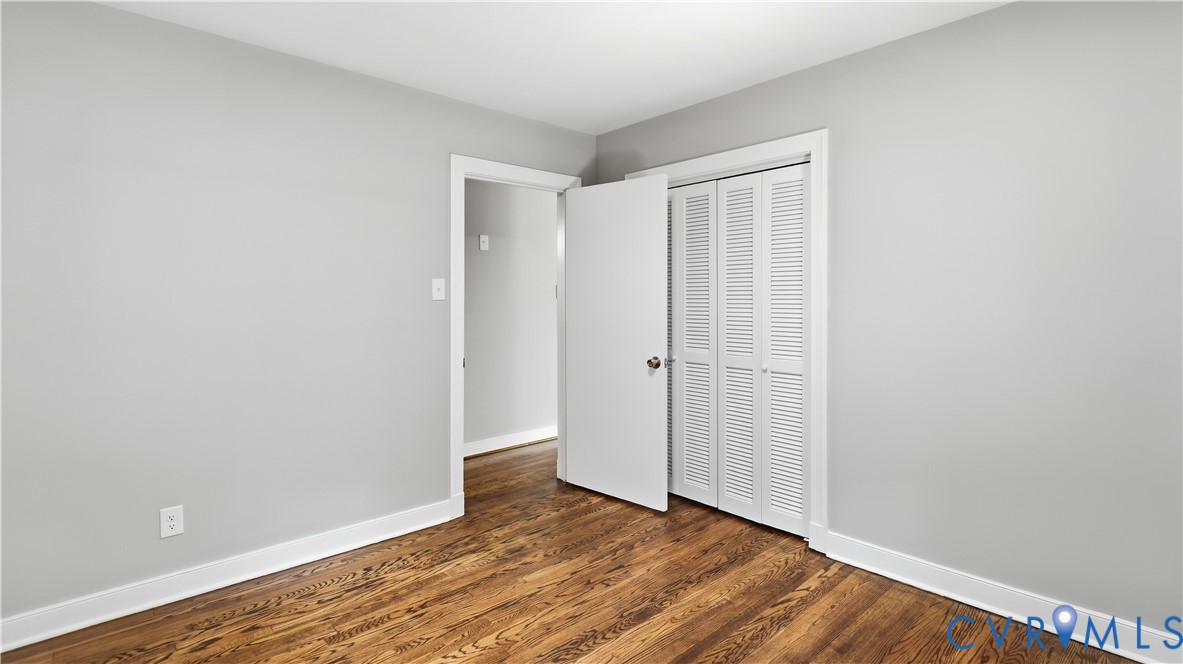 2301 Traymore Road North Chesterfield, VA 23235 - Photo 34 of 67 Wood-finish flooring, white baseboards, and a louv