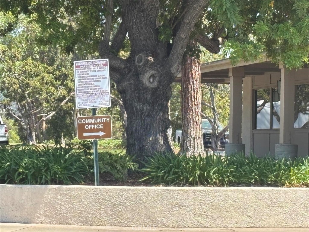 13634 La Jolla Circle, Unit 13E La Mirada, CA 90638 - Photo 18 of 32 a sign that is on the side of a tree