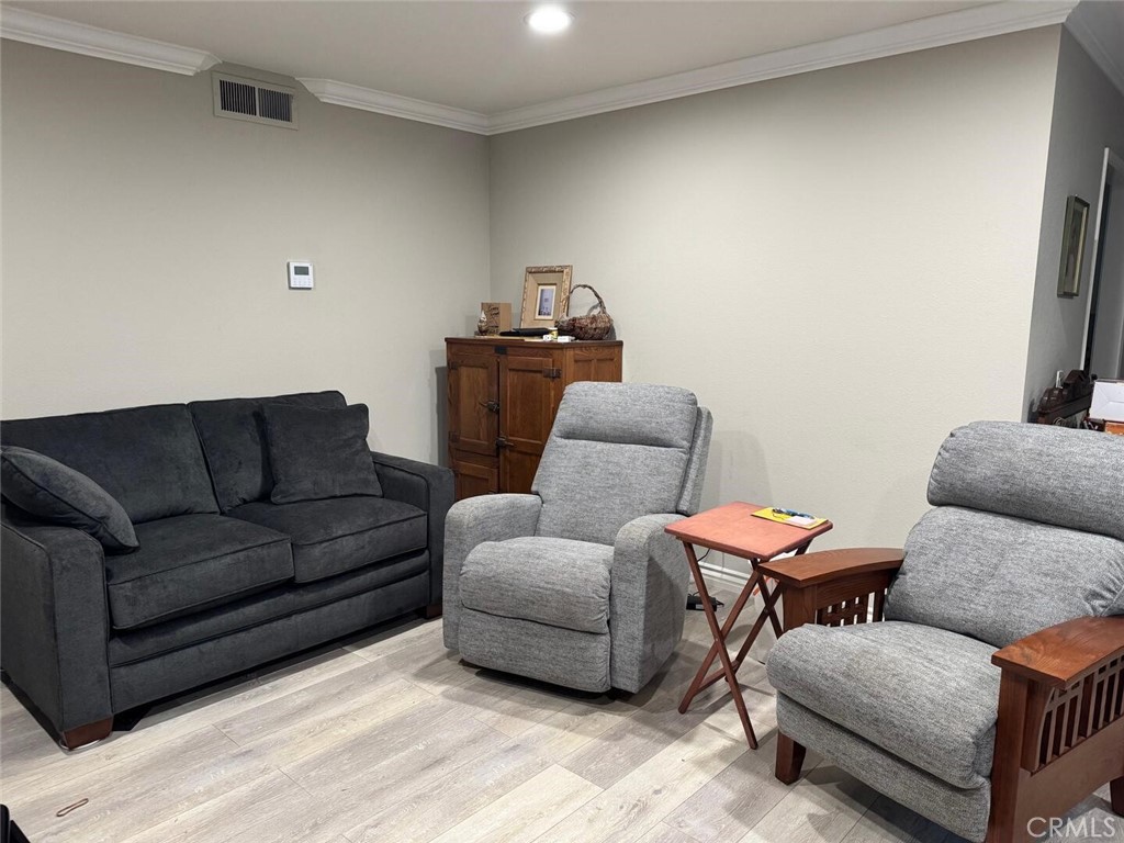 13634 La Jolla Circle, Unit 13E La Mirada, CA 90638 - Photo 5 of 32 a living room with furniture and a couch