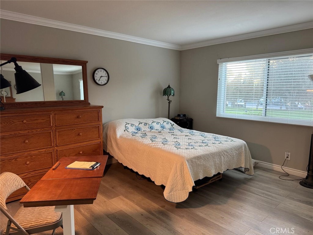 13634 La Jolla Circle, Unit 13E La Mirada, CA 90638 - Photo 10 of 32 a bedroom with a bed and window