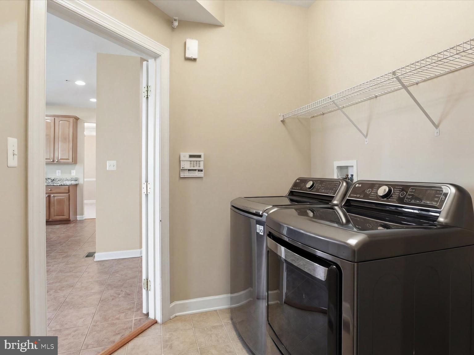 14202 Derby Ridge Road Bowie, MD 20721 - Photo 23 of 57 MUD ROOM WITH WASHER AND DRYER