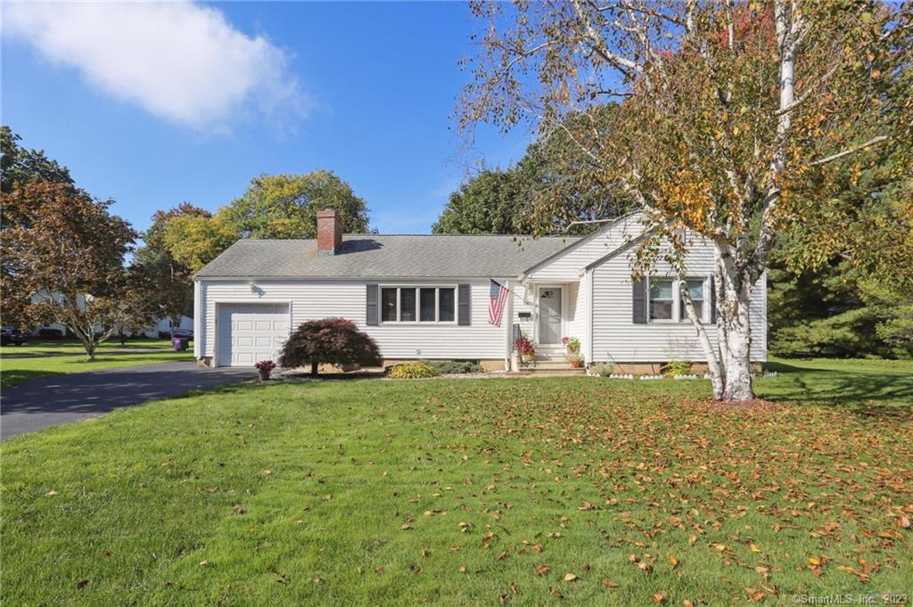 91 Foxridge Road West Hartford, CT 06107 - Photo 1 of 1 a front view of a house with a yard