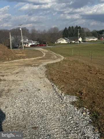 a view of a water with a building in the background
