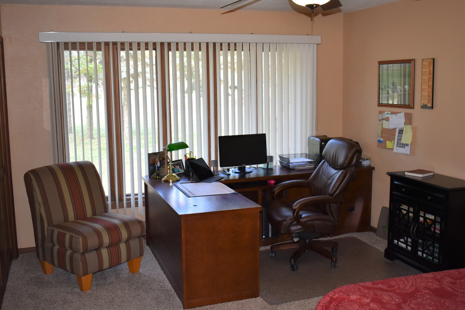 1413 East 550th Road Lostant, IL 61334 - Photo 13 of 37 a view of a workspace with furniture and a window