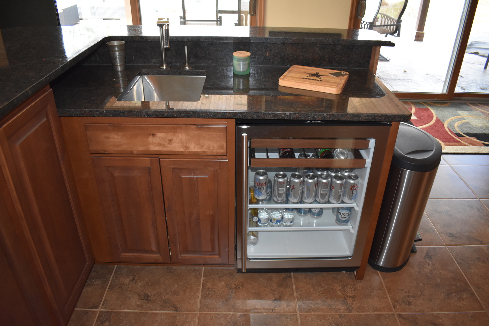 1413 East 550th Road Lostant, IL 61334 - Photo 24 of 37 a kitchen with stainless steel appliances granite countertop a stove and a refrigerator
